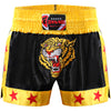Farabi Sports Muay Thai shorts with a bold black and yellow design featuring a fierce tiger graphic for durability and style.